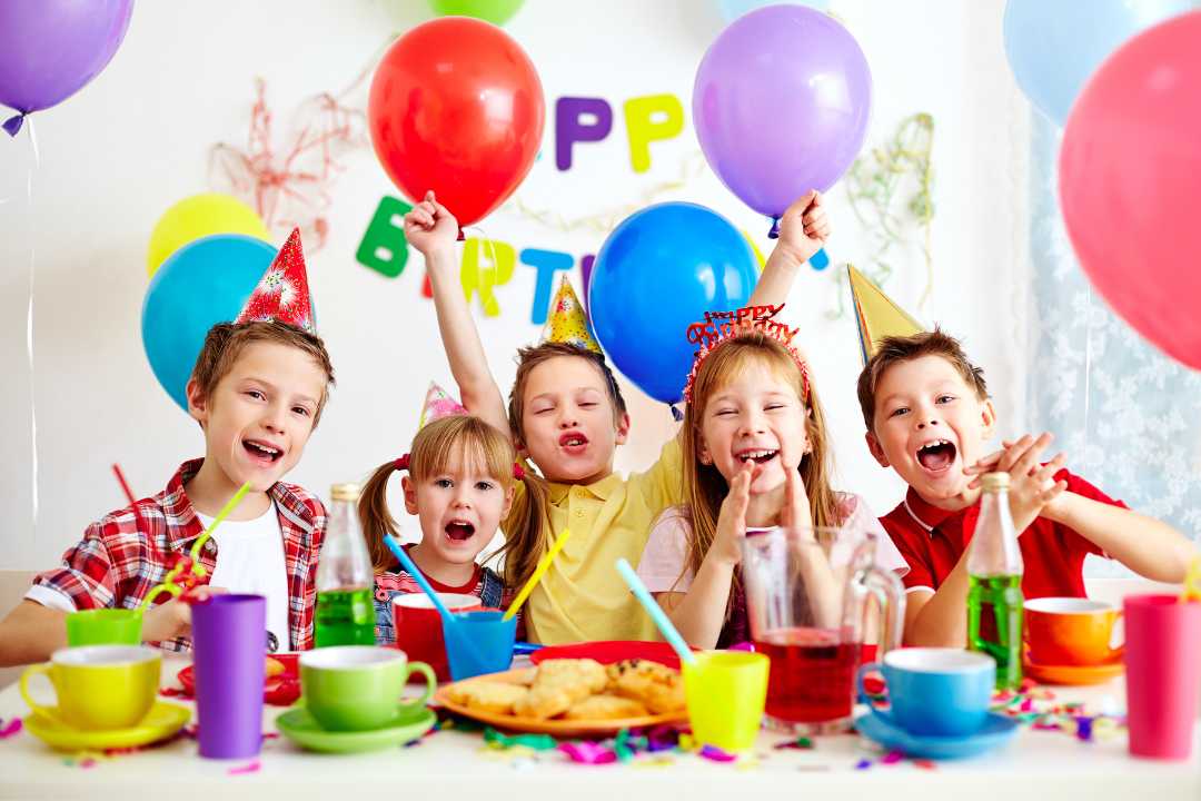 "Snacks for birthday party at home" for an image of a family enjoying snacks at a home birthday party